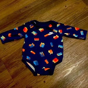 Nike. Boys blue and orange onesie. Size 3 months.